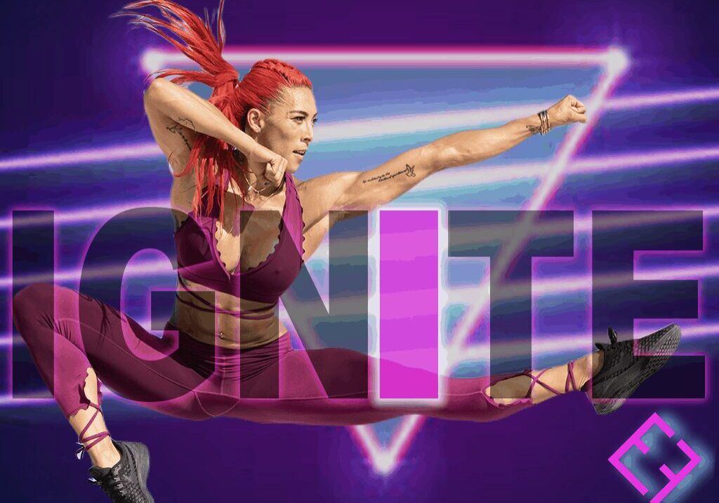 IGNITE COVER | HANNAH EDEN WITH RED HAIR LEAPING INTO A KICK